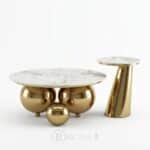 Ensemble composé d’une grande table basse ronde à base sphérique et d’une petite table d’appoint