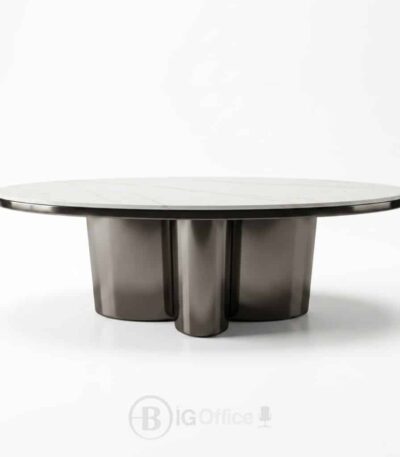 Table basse ovale contemporaine avec plateau en céramique et base sculpturale métallique.