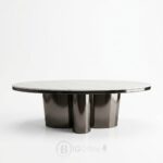 Table basse ovale avec plateau en céramique et structure en acier inoxydable 130 cm